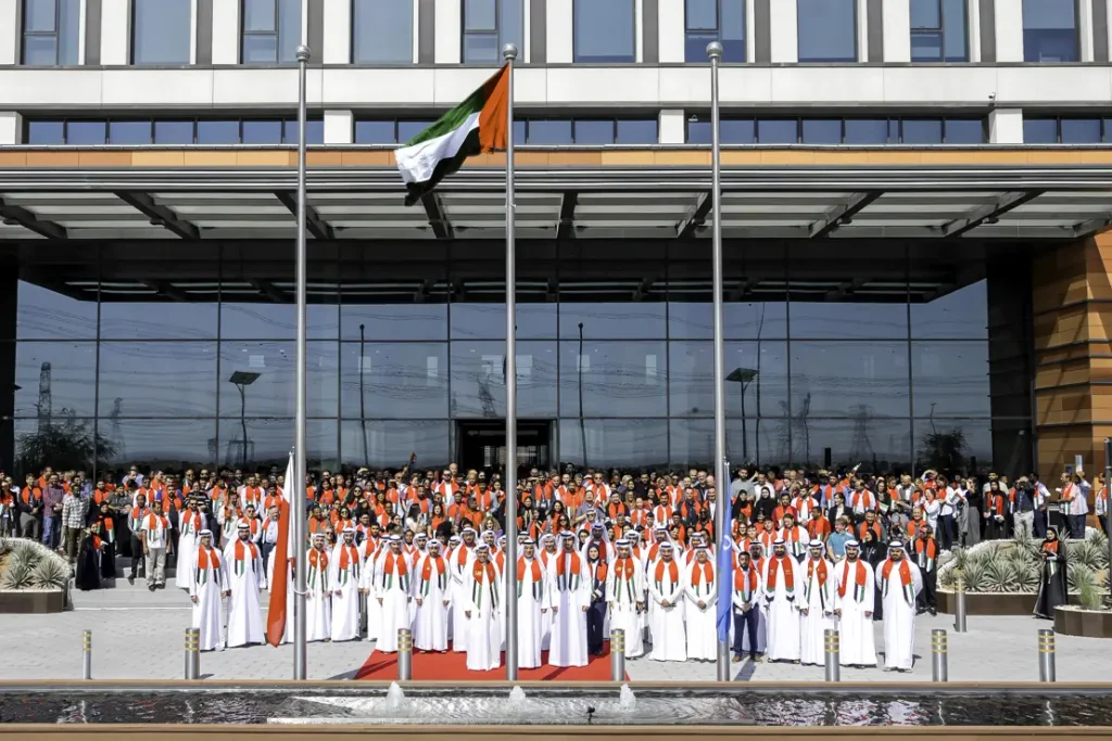 Employees gathered for a UAE flag-raising ceremony in Dubai